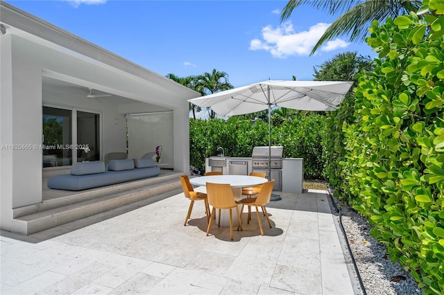 9033 Emerson Ave, Surfside, FL 33154 - view of patio / terrace featuring outdoor dining area, exterior kitchen, and a ceiling fan