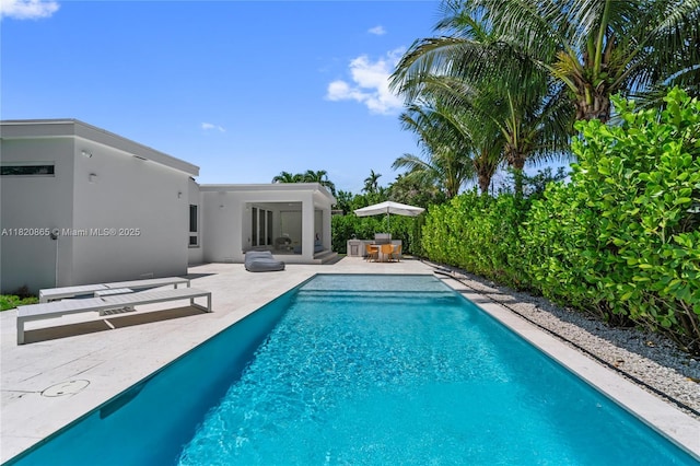 9033 Emerson Ave, Surfside, FL 33154 - view of swimming pool featuring a patio
