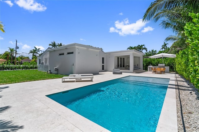 9033 Emerson Ave, Surfside, FL 33154 - swimming pool featuring a patio area and outdoor dining area