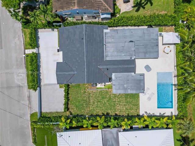 9033 Emerson Ave, Surfside, FL 33154 - drone / aerial view of a pool area