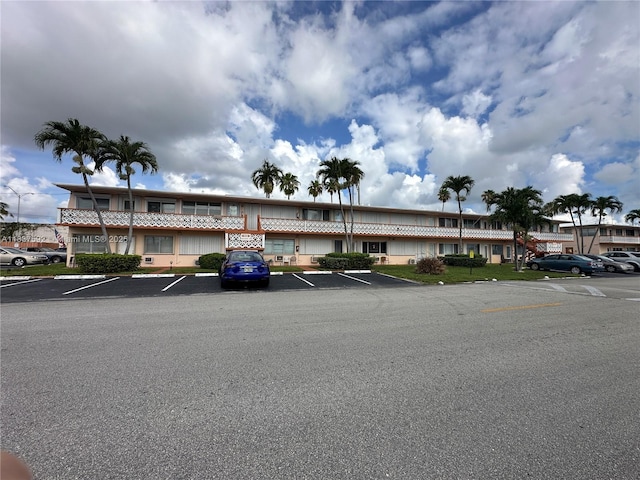 920 SW 11th Ave Unit 12A, Hallandale Beach, FL 33009 - view of building exterior featuring uncovered parking