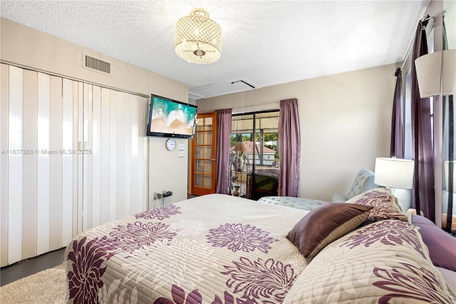 20145 NE 3rd Ct Unit 2, Miami, FL 33179 - bedroom with a textured ceiling