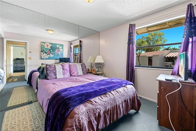 20145 NE 3rd Ct Unit 2, Miami, FL 33179 - carpeted bedroom with multiple windows and a textured ceiling