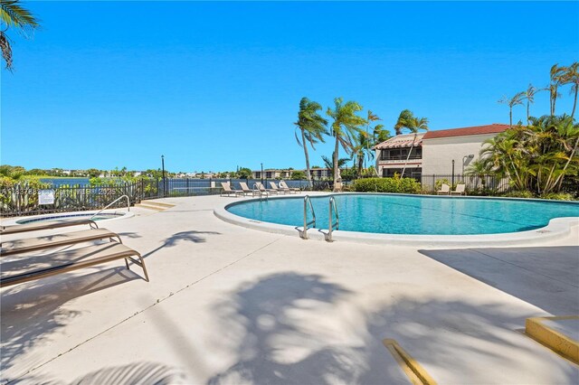 20145 NE 3rd Ct Unit 2, Miami, FL 33179 - community pool featuring a patio and a hot tub