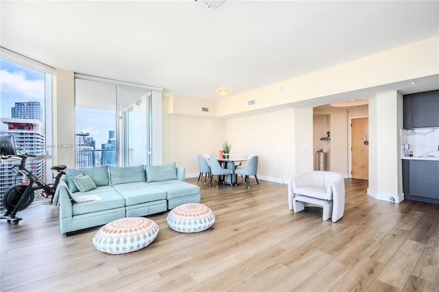 244 Biscayne Blvd Unit 4803, Miami, FL 33132 - living room with light wood-type flooring, plenty of natural light, and a view of city