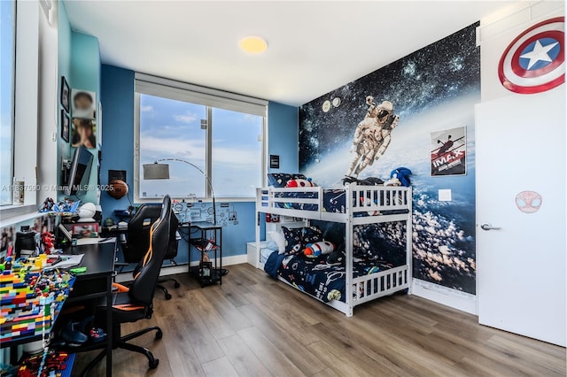 244 Biscayne Blvd Unit 4803, Miami, FL 33132 - bedroom with wood finished floors and a desk