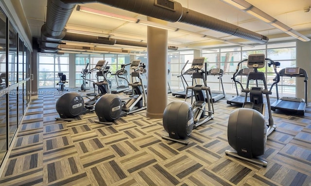 244 Biscayne Blvd Unit 4803, Miami, FL 33132 - workout area featuring carpet flooring and healthy amount of natural light