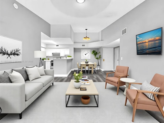 2071 Renaissance Blvd Unit 303, Miramar, FL 33025 - living room featuring wood finished floors and baseboards