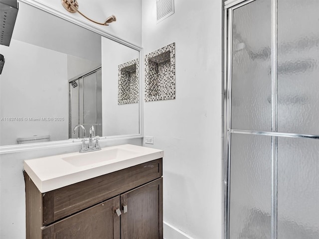 2071 Renaissance Blvd Unit 303, Miramar, FL 33025 - bathroom with an enclosed shower and vanity