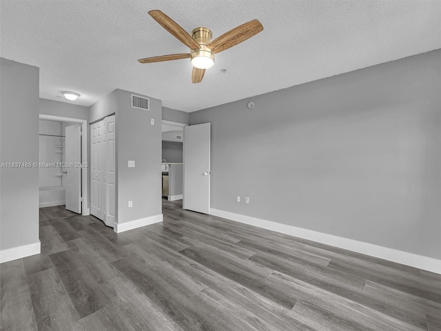 2071 Renaissance Blvd Unit 303, Miramar, FL 33025 - unfurnished living room featuring ceiling fan, wood finished floors, and a textured ceiling