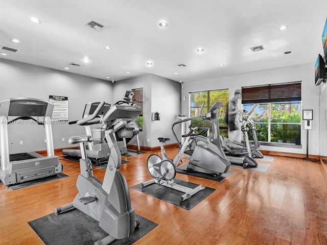 2071 Renaissance Blvd Unit 303, Miramar, FL 33025 - gym with wood finished floors and recessed lighting