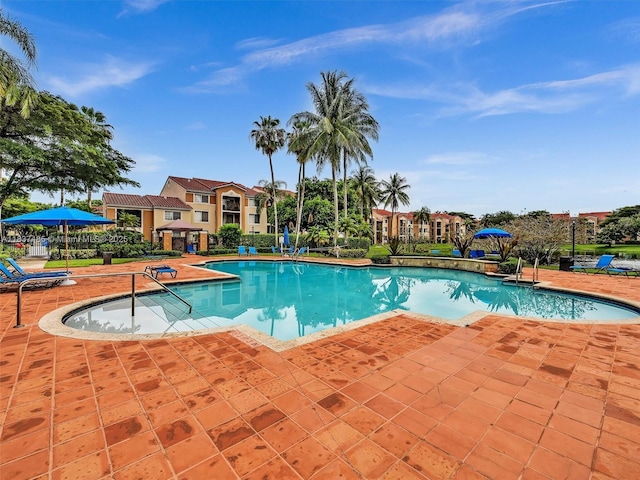 2071 Renaissance Blvd Unit 303, Miramar, FL 33025 - community pool featuring a patio area