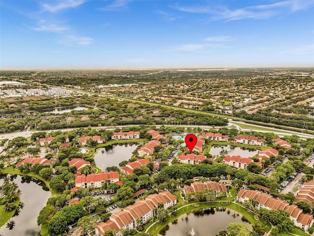 2071 Renaissance Blvd Unit 303, Miramar, FL 33025 - aerial view of property and surrounding area with a large body of water and nearby suburban area