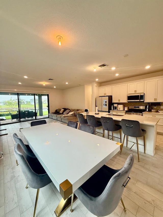 4468 Spruce Ln, Oakland Park, FL 33309 - dining area with recessed lighting
