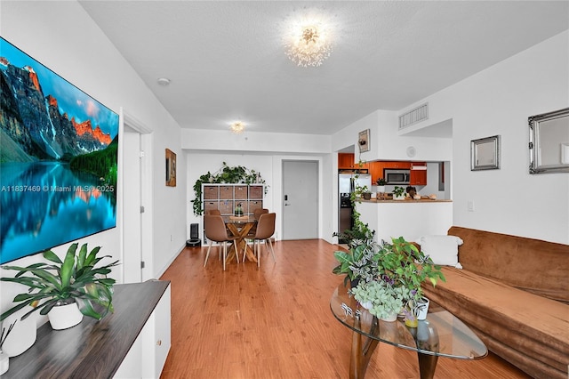 36 NW 6th Ave Unit 701, Miami, FL 33128 - living area featuring light wood finished floors