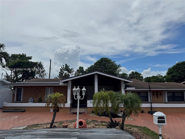 5372 W 9th Ave, Hialeah, FL 33012 - view of front of property with roof with shingles