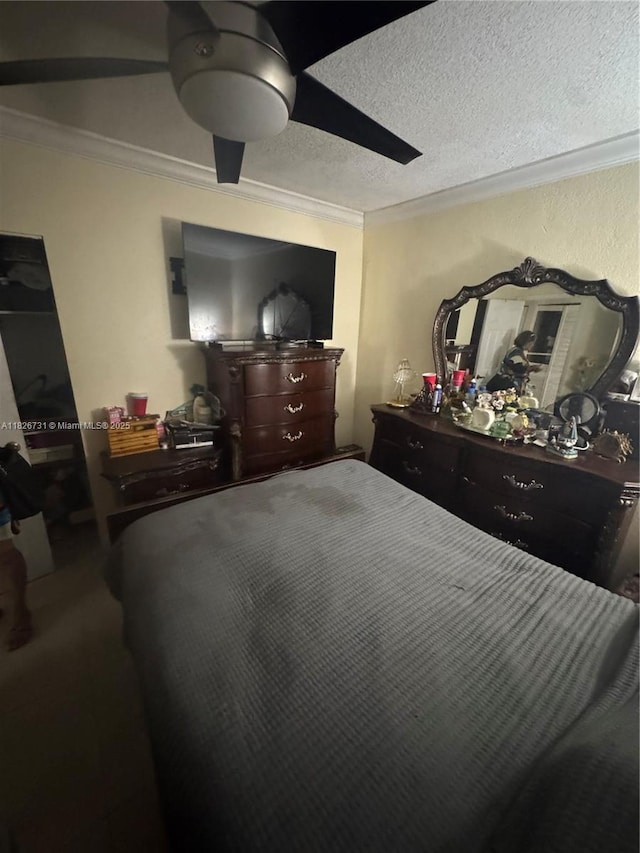 5372 W 9th Ave, Hialeah, FL 33012 - bedroom with ornamental molding, a ceiling fan, carpet, and a textured ceiling
