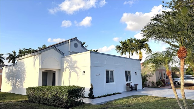 12239 NW 7th St, Miami, FL 33182 - view of property exterior featuring stucco siding