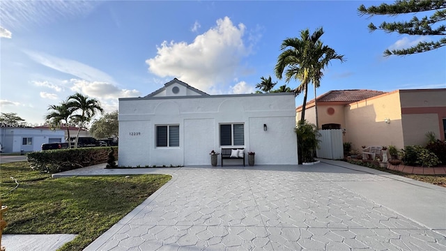 12239 NW 7th St, Miami, FL 33182 - mediterranean / spanish-style home with stucco siding and decorative driveway
