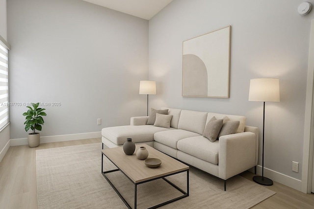 12239 NW 7th St, Miami, FL 33182 - living area with light wood-style floors and baseboards
