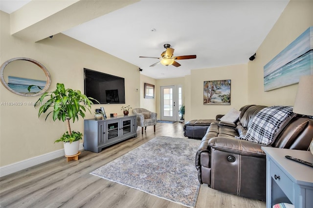1533 Shenandoah St, Hollywood, FL 33020 - living area featuring a ceiling fan and light wood-style floors