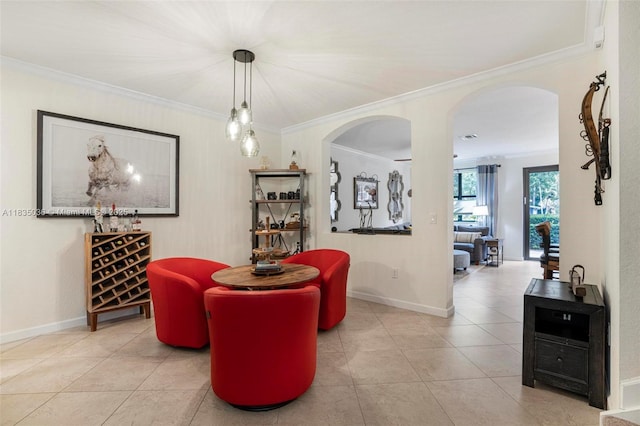12125 S Vaquero Trails Dr, Davie, FL 33325 - tiled dining space featuring ornamental molding and arched walkways
