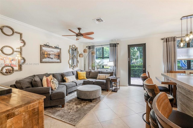 12125 S Vaquero Trails Dr, Davie, FL 33325 - living area with ornamental molding, light tile patterned floors, and a ceiling fan