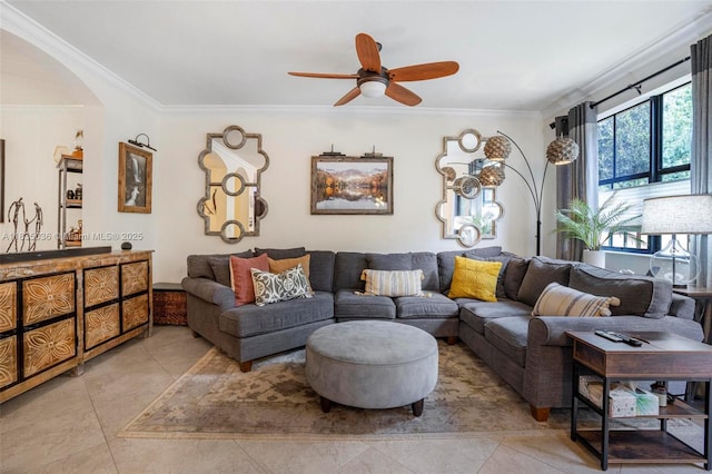 12125 S Vaquero Trails Dr, Davie, FL 33325 - living area with crown molding, a ceiling fan, arched walkways, and light tile patterned flooring