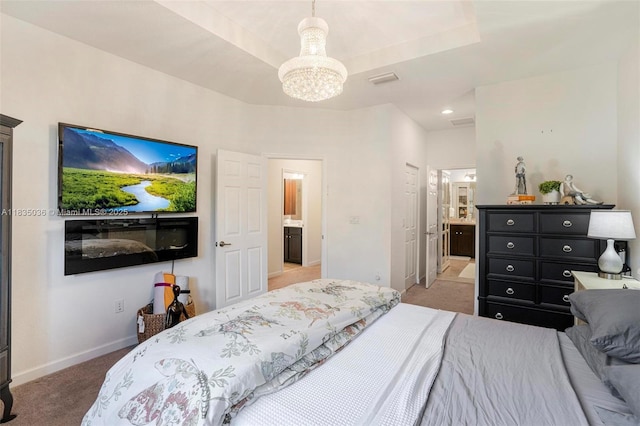 12125 S Vaquero Trails Dr, Davie, FL 33325 - bedroom with light colored carpet, a chandelier, ensuite bathroom, and recessed lighting