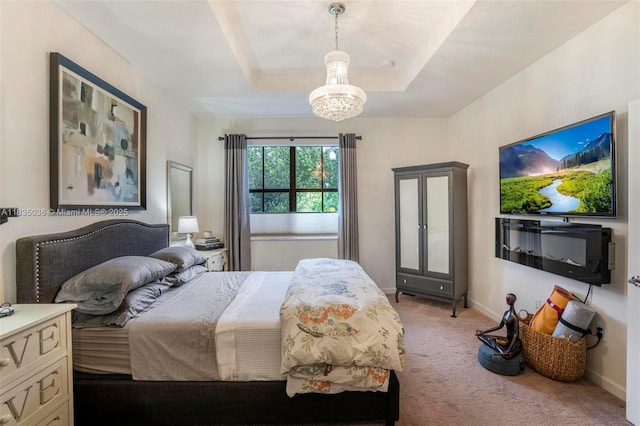 12125 S Vaquero Trails Dr, Davie, FL 33325 - bedroom with light colored carpet, a chandelier, and a tray ceiling
