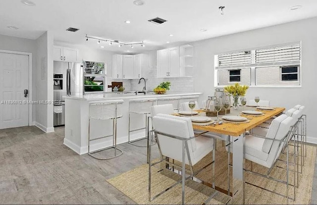 103 Lake Terry Dr, West Palm Beach, FL 33411 - dining room featuring light wood-style floors and recessed lighting