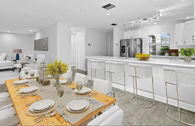103 Lake Terry Dr, West Palm Beach, FL 33411 - dining area featuring wood finished floors and recessed lighting