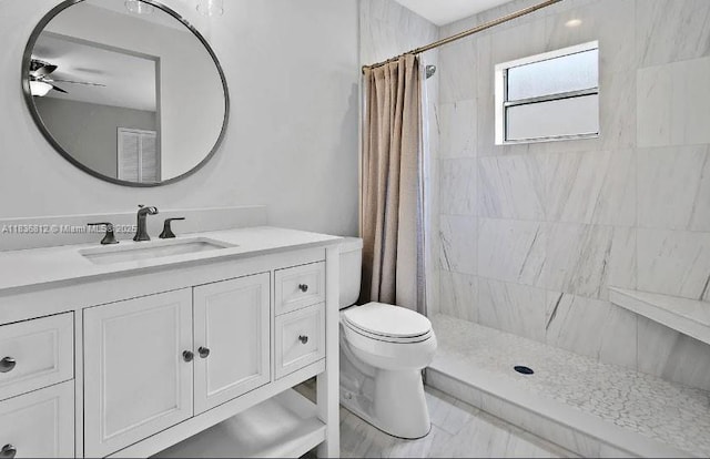 103 Lake Terry Dr, West Palm Beach, FL 33411 - bathroom featuring a ceiling fan, a tile shower, and vanity