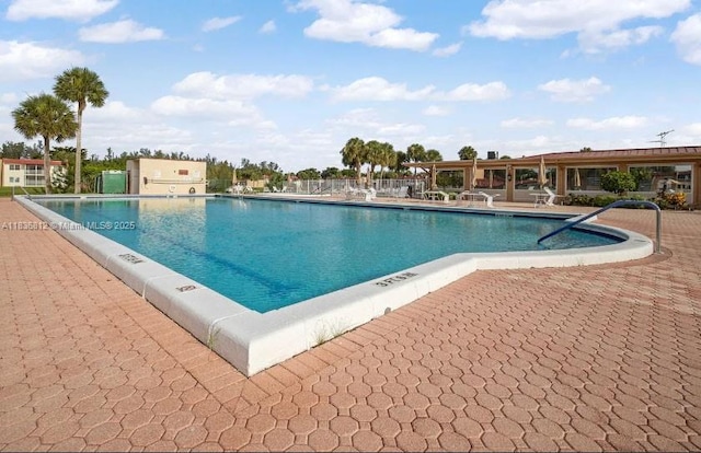 103 Lake Terry Dr, West Palm Beach, FL 33411 - community pool featuring a patio area