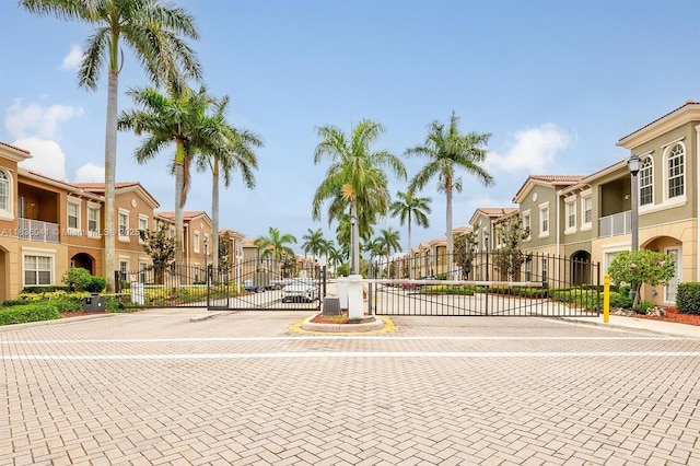 5963 Royal Way, Tamarac, FL 33321 - view of road featuring a residential view, a gate, and a gated entry