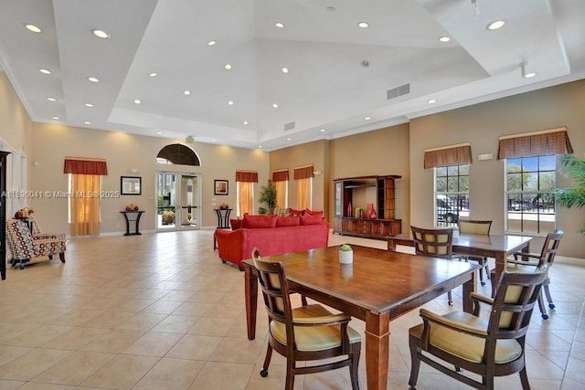 5963 Royal Way, Tamarac, FL 33321 - dining room with a tray ceiling, a towering ceiling, light tile patterned flooring, and recessed lighting