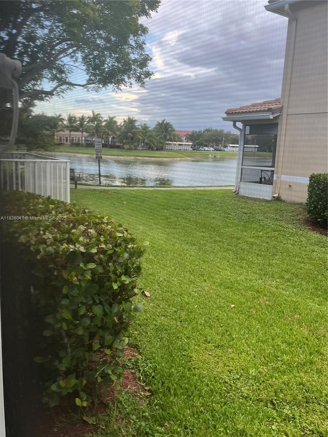 5963 Royal Way, Tamarac, FL 33321 - view of green lawn with a water view