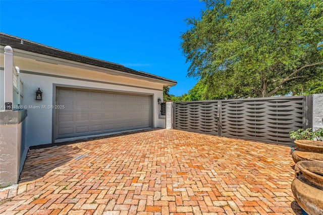 17940 SW 83rd Ave, Palmetto Bay, FL 33157 - garage featuring decorative driveway