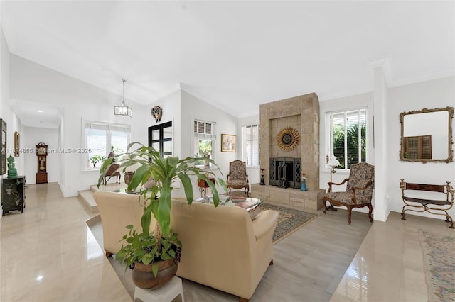 17940 SW 83rd Ave, Palmetto Bay, FL 33157 - living room with vaulted ceiling, a fireplace, and crown molding