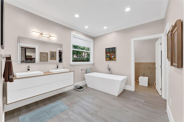 17940 SW 83rd Ave, Palmetto Bay, FL 33157 - full bath with double vanity, a soaking tub, recessed lighting, and crown molding