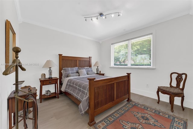 17940 SW 83rd Ave, Palmetto Bay, FL 33157 - bedroom featuring light wood-style floors and crown molding