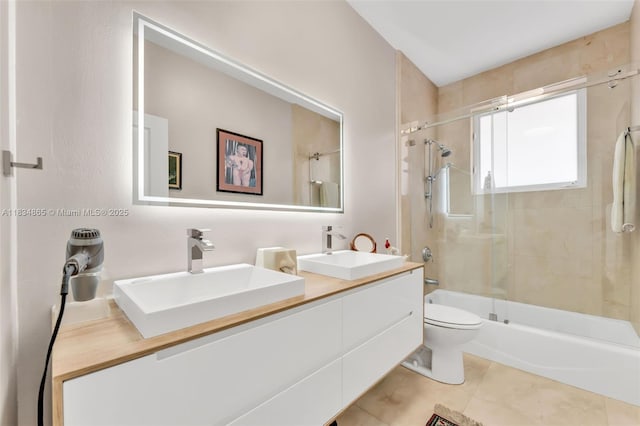 17940 SW 83rd Ave, Palmetto Bay, FL 33157 - bathroom with double vanity, bath / shower combo with glass door, and tile patterned flooring