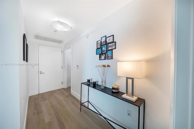 1900 N Bayshore Dr Unit 4111, Miami, FL 33132 - corridor featuring wood finished floors and baseboards