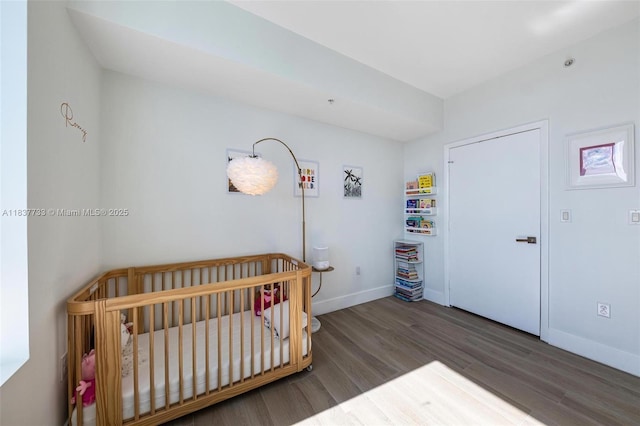 1900 N Bayshore Dr Unit 4111, Miami, FL 33132 - bedroom with wood finished floors and a crib