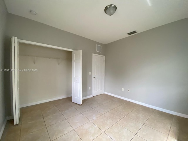 6124 SW 39th St, Miramar, FL 33023 - unfurnished bedroom featuring light tile patterned floors and a closet