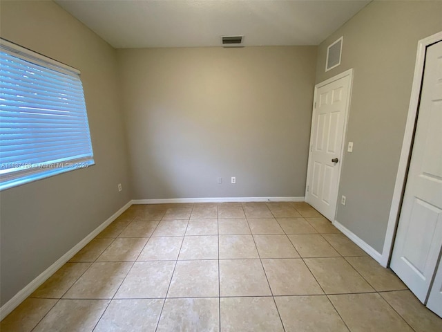 6124 SW 39th St, Miramar, FL 33023 - spare room featuring light tile patterned flooring and baseboards