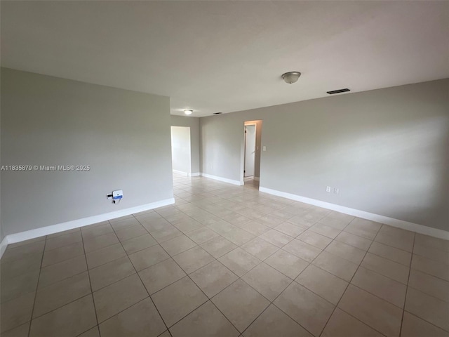 6837 NW 28th St, Sunrise, FL 33313 - unfurnished room featuring light tile patterned floors and baseboards