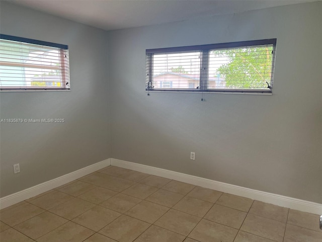 6837 NW 28th St, Sunrise, FL 33313 - unfurnished room with baseboards and light tile patterned floors