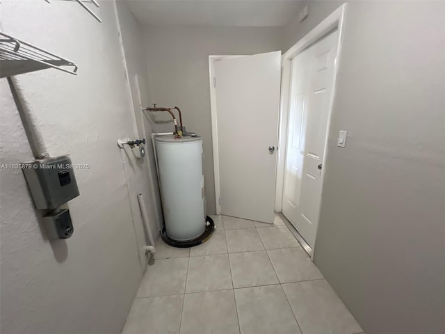 6837 NW 28th St, Sunrise, FL 33313 - utility room featuring electric water heater