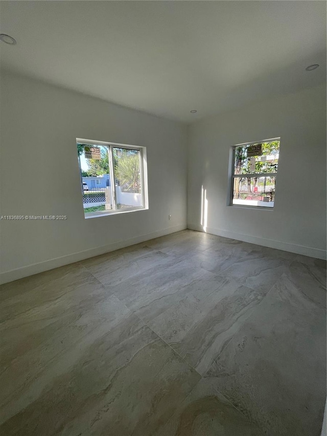 1310 Sharazad Blvd, Opa Locka, FL 33054 - unfurnished room with plenty of natural light